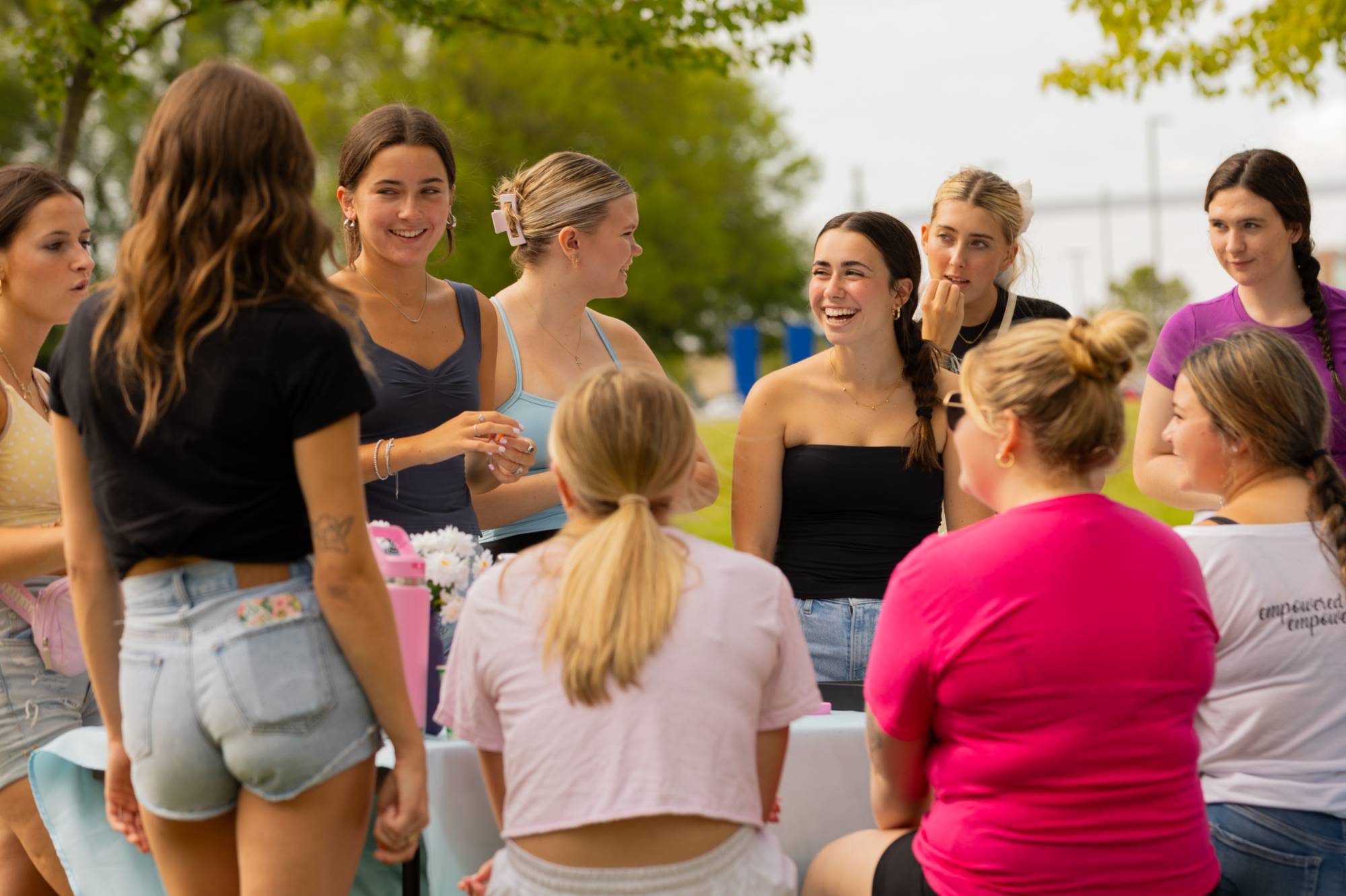 group of sorority women talking at table
